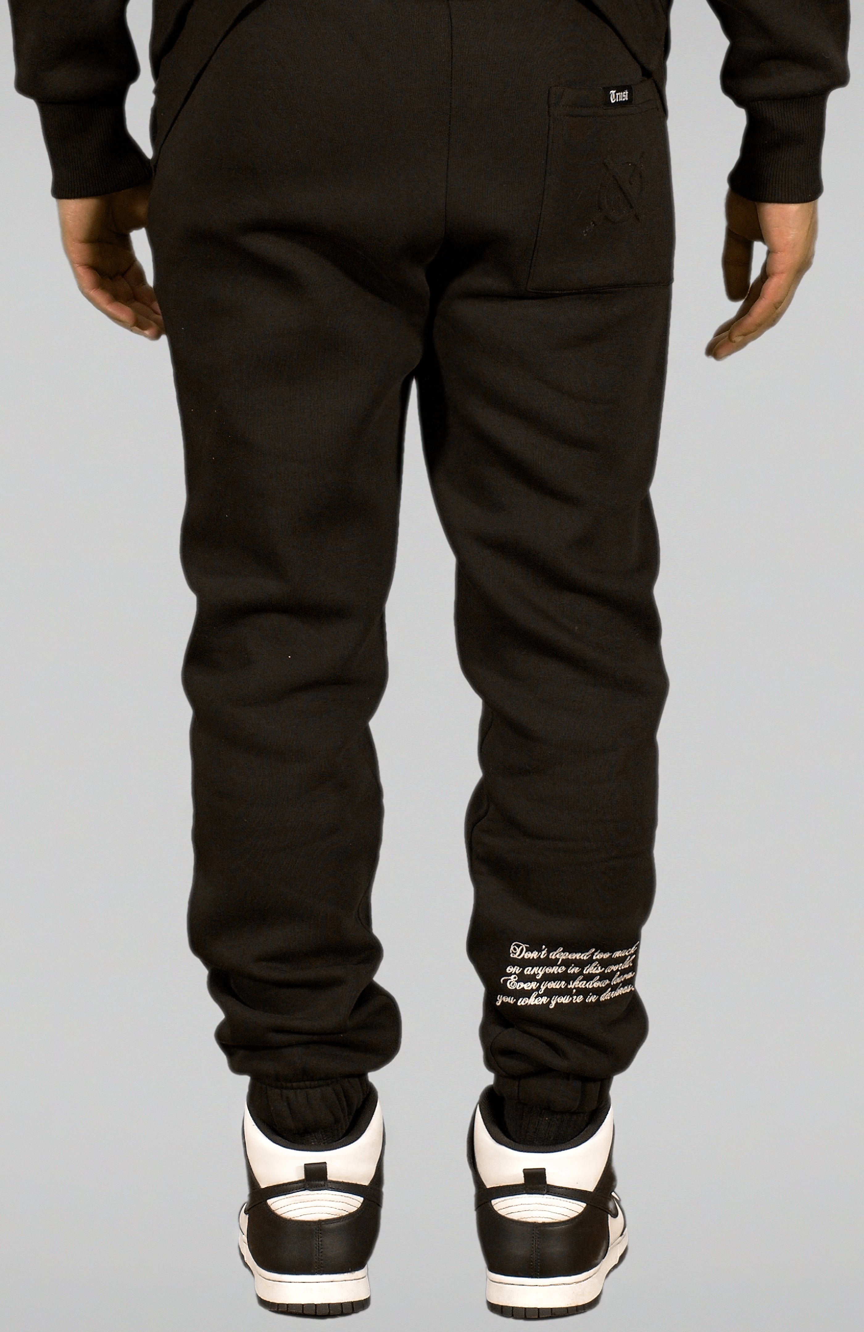 'TRUST Nobody' Dark Sweatpants - TRUST Amsterdam