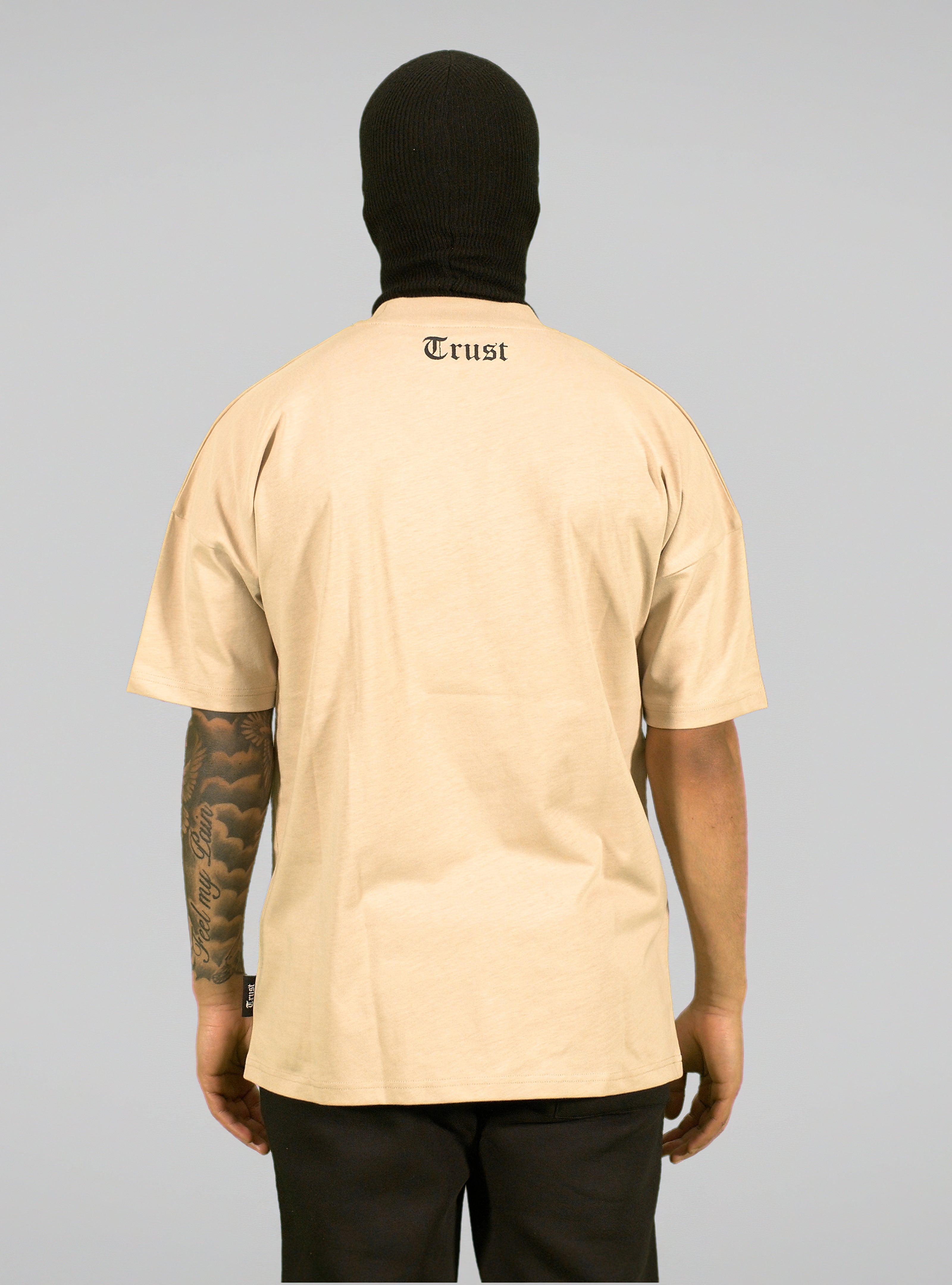 'TRUST Nobody' Middlefinger Sand Tee - TRUST Amsterdam